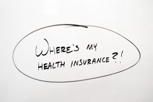 Where's my health insurance? written on whiteboard