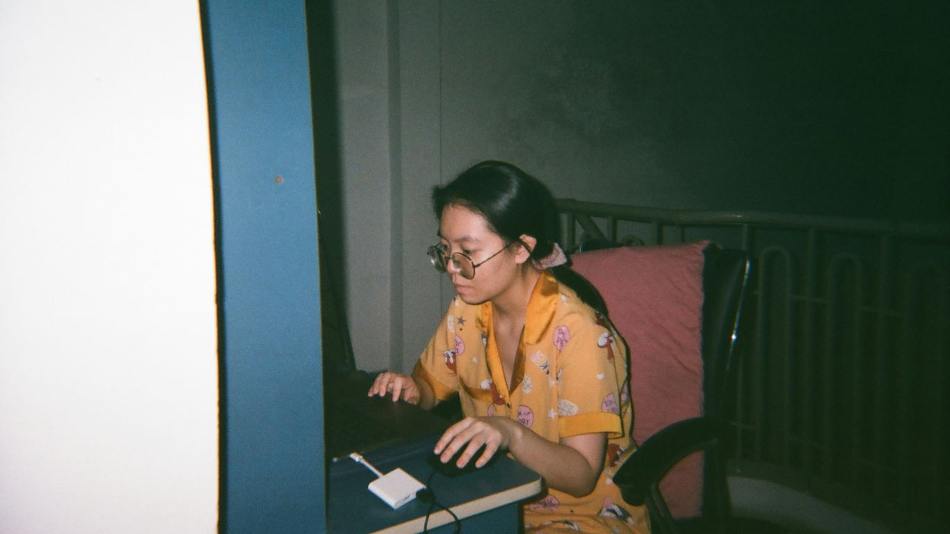 a person sitting at a desk