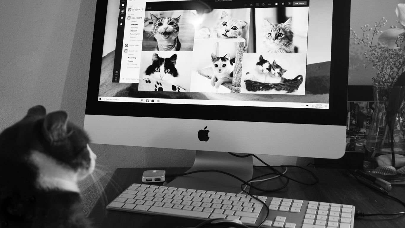 silver imac with keyboard and mouse