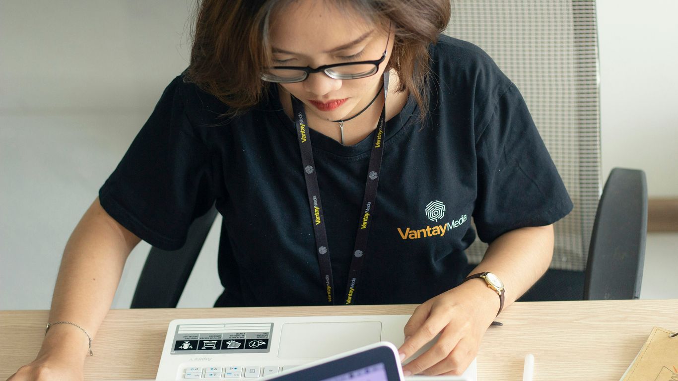 woman looking at laptop